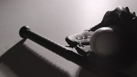Monochromatic-Close-Up-Studio-Baseball-Still-Life-With-Bat-Ball-And-Catchers-Mitt